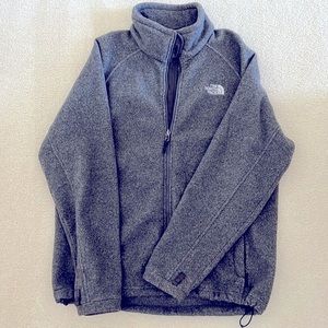 Mens size larg north face fleece zip up jacket. Color: gray.
